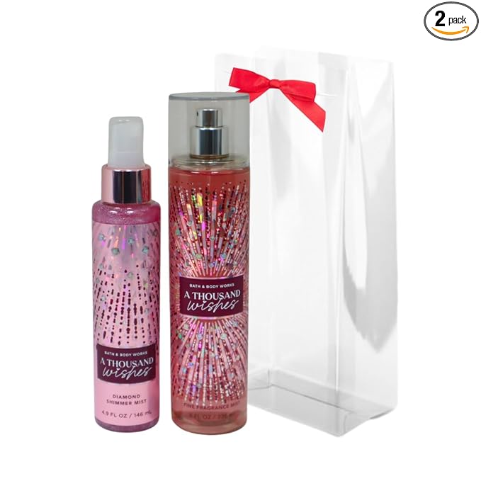 Bath & Body Works A Thousand Wishes Fine Fragrance Body Mist 8 oz & A Thousand Wishes Fine Fragrance Shimmer Body Mist 4.9 oz Gift Set packaging with a Red bow