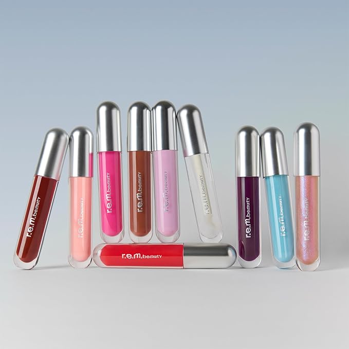 r.e.m. beauty by ariana grande | Essential Drip Glossy Balm in Cosmo | High Shine Nourishing Lip Balm | Hydrating Hyaluronic Acid | Smooth Glossy Finish