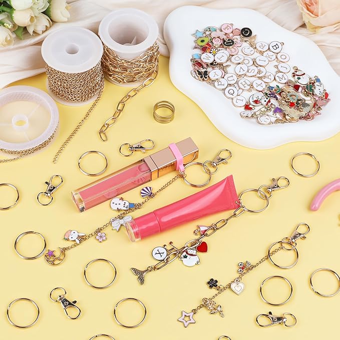 Starry 451 Pcs Lip Gloss Keychain Making Kit 126 Charms 22.97 ft Gold Chains with 30 Lipgloss Rubber Rings 20 Keychain Clips DIY Crafts for Women