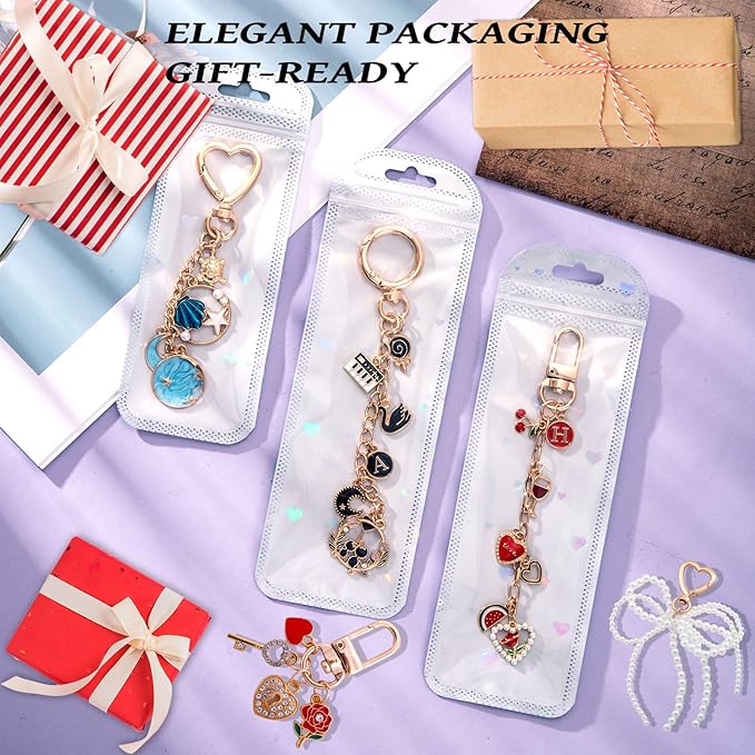 Wurosi 544Pcs Charms Lip Gloss Keychain Making Kit, Bag Charm Kits with Key Chain Hooks, Charms, Chains, Jump Rings, Lobster Clasps, Plier, Gift Bags & Tools, DIY Craft Supplies, Valentines Gifts
